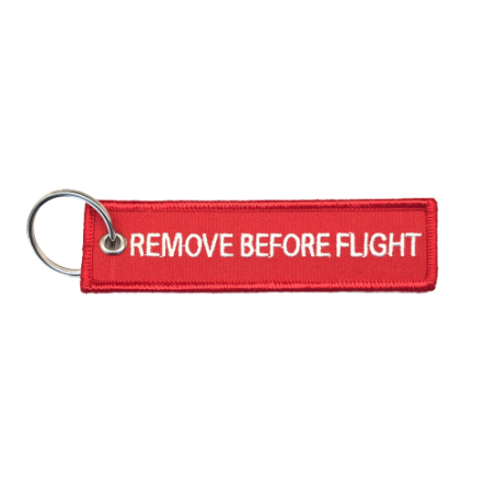Schlüsselanhänger REMOVE BEFORE FLY